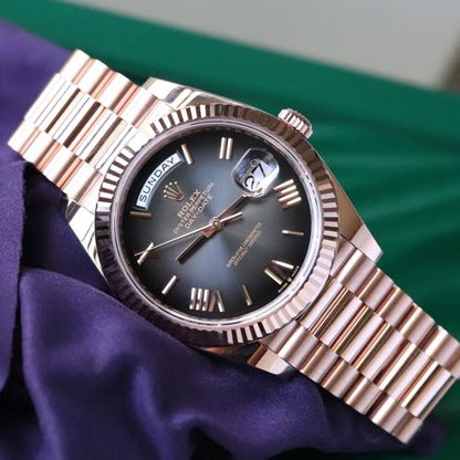 ROLE_X DAY DATE 40 IN EVEROSE GOLD WITH A SLATE OMBRE DIAL